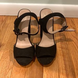Black sandal heels with strap